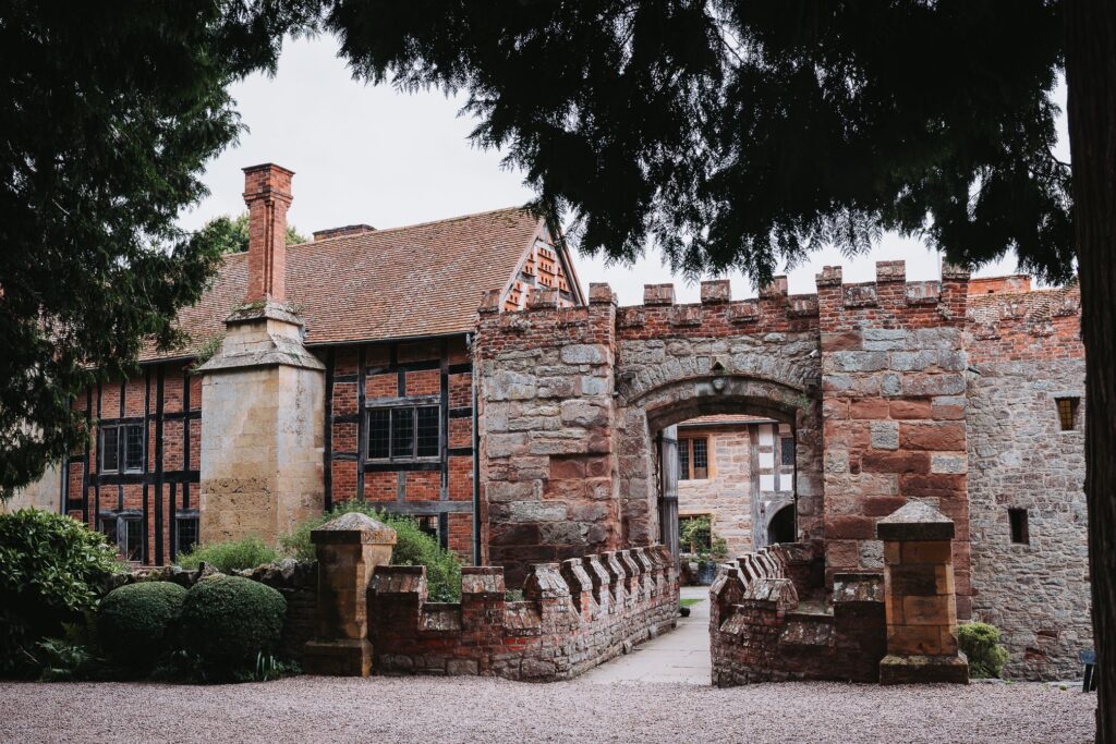 Stone entrance and moat at Birtsmorton Court